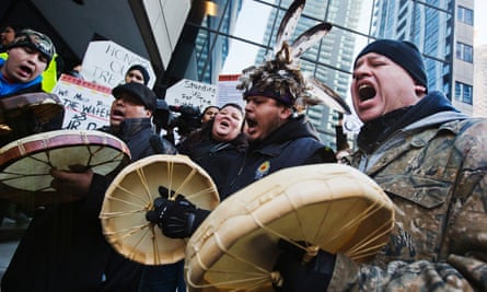 First Nations protesters sing as they take part in a ‘Idle No More’ demonstration in Toronto.
