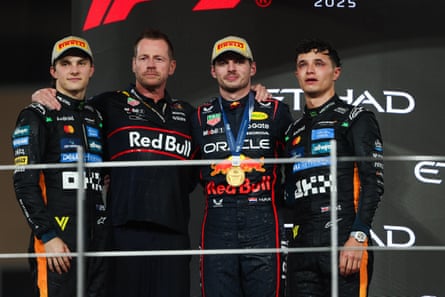 Oscar Piastri (left) on the podium after his second place in Abu Dhabi