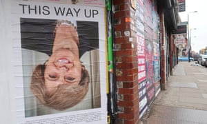 Theresa May upside down poster