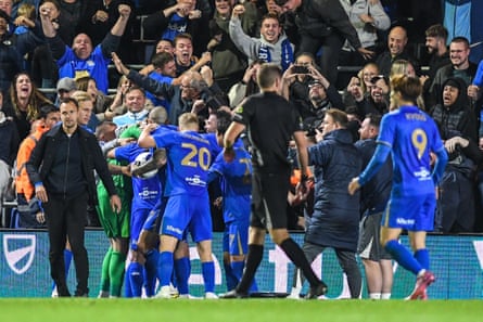 Birmingham City’s Demarai Gray celebrates with teammates after his equaliser deep into added time against Sheffield Wednesday.