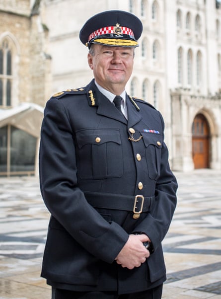 Ian Dyson posing for a photo in his City of London police uniform
