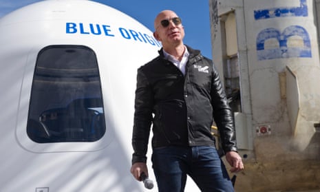 Jess Bezos in 2017, with his Blue Origin rocket. On Saturday, the winner of an auction for a seat to accompany Bezos and his brother Mark on his big space adventure will be announced.