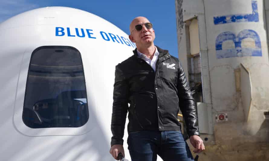 Jeff Bezos with the Blue Origin New Shepard rocket booster in Colorado Springs, US, April 2017