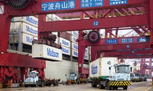 Goods are unloaded at a container terminal of Ningbo Zhoushan Port as more than a dozen Chinese-listed companies said they had suspended production in coronavirus-hit parts of China’s eastern Zhejiang province.