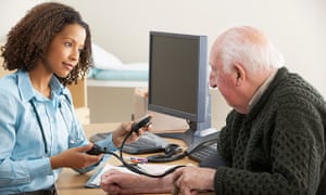 GP treating an elderly patient