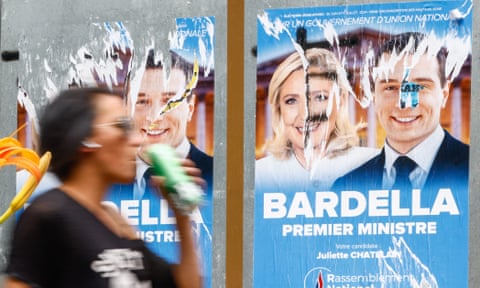 Legislative election posters on billboards, including French member of parliament and previous candidate for French presidential election Marine Le Pen (left) and Leader of the French extreme right party Rassemblement National (RN, National Front) Jordan Bardella (right), outside of polling station in Malakoff, near Paris, France,