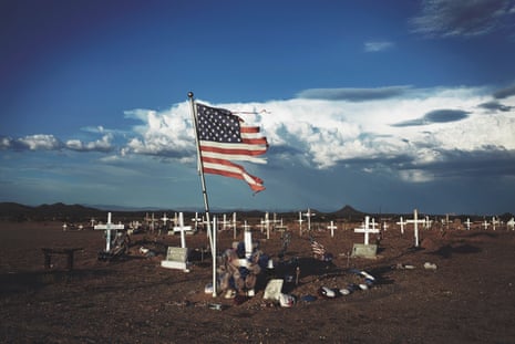 A shredded American flag at a grave site in Blackwater, Arizona.
