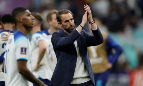 Gareth Southgate applauds England’s fans after the World Cup quarter-final defeat by France.