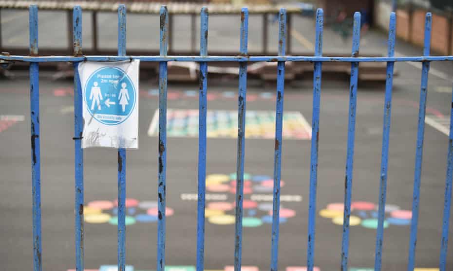 Social distancing signage outside a school