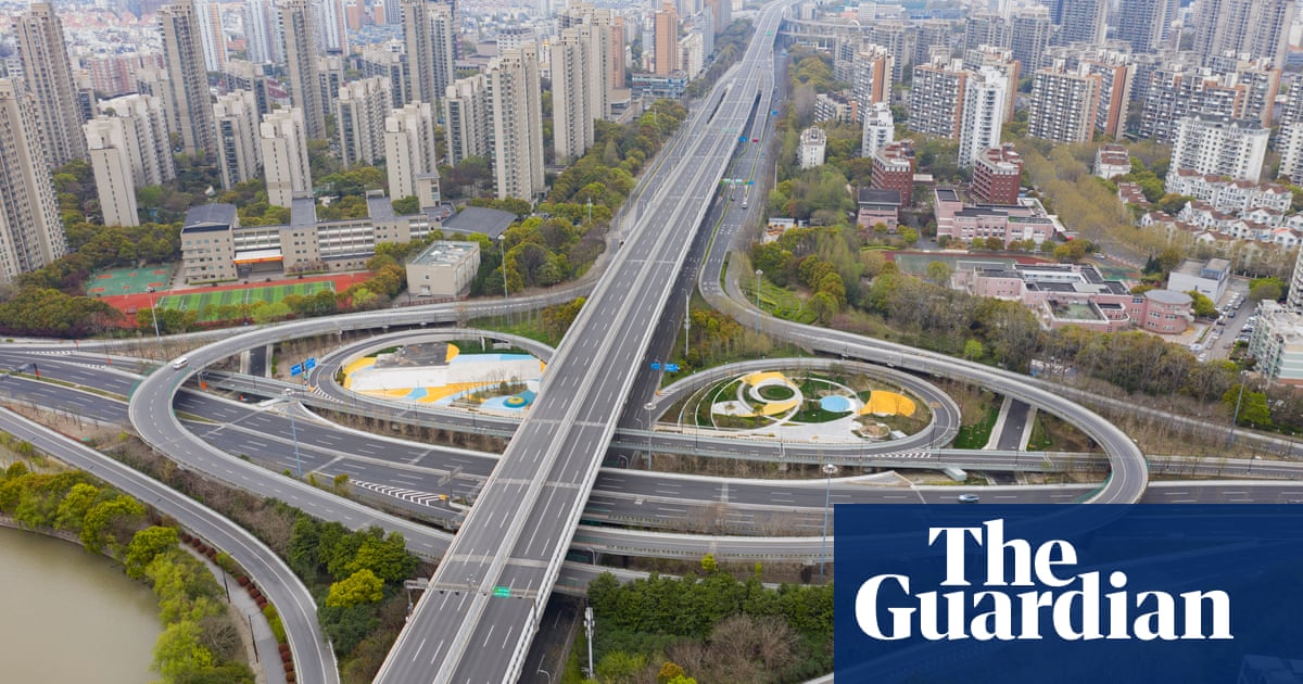 Drone footage shows deserted Shanghai as city remains in lockdown – video