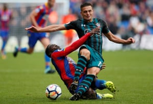 Southampton’s Dusan Tadic is tackled by Crystal Palace’s Jeffrey Schlupp as The Eagles loose 1-0 to The Saints at Selhurst Park.