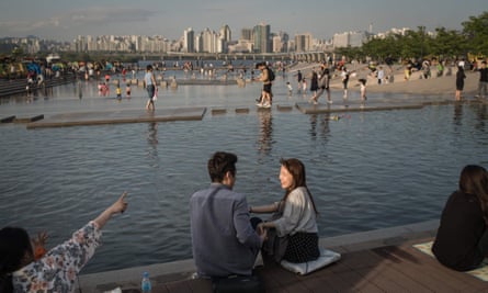 Han river and the city skyline, at Yeouido park in Seoul.