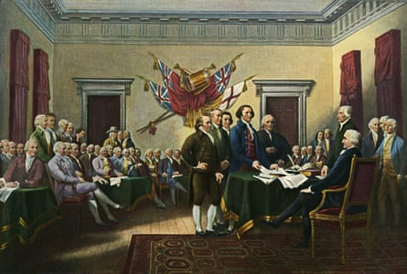 A painting depicting the founing fathers signing a document as rows of people watch