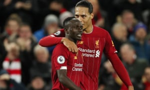 Premier League - Liverpool v Everton<br>Soccer Football - Premier League - Liverpool v Everton - Anfield, Liverpool, Britain - December 4, 2019 Liverpool's Sadio Mane celebrates scoring their fourth goal with Virgil van Dijk Action Images via Reuters/Lee Smith EDITORIAL USE ONLY. No use with unauthorized audio, video, data, fixture lists, club/league logos or "live" services. Online in-match use limited to 75 images, no video emulation. No use in betting, games or single club/league/player publications. Please contact your account representative for further details.