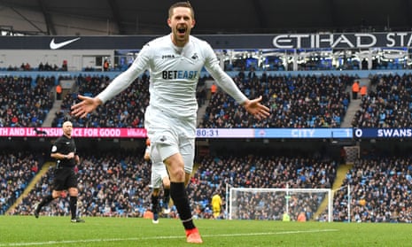Gylfi Sigurdsson celebrates scoring for Swansea at Manchester City last season and could make his Everton debut at the Etihad Stadium on Monday night.