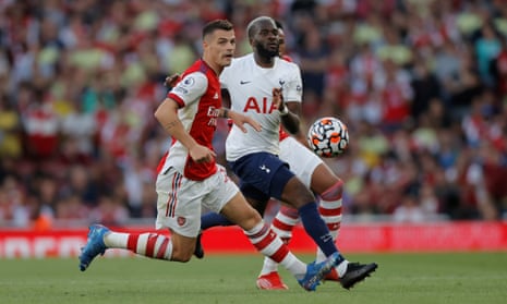 Arsenal's Granit Xhaka tangles with Tottenham's Tanguy Ndombele