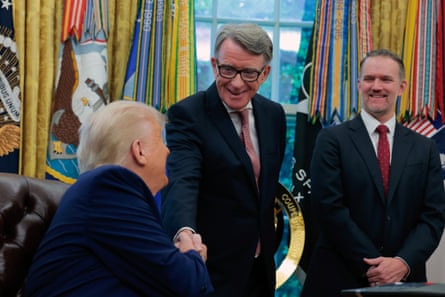 Donald Trump shakes hands with Peter Mandelson in the Oval Office.