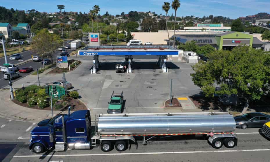 A fuel truck drives by a Chevron station in Richmond, California.
