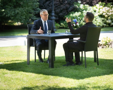 Ukraine's president Volodymyr Zelenskyy and Britain's prime minister Keir Starmer meet in the gardens of the Presidential Palace in Kyiv, Ukraine.