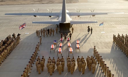 The coffins of military personnel killed when a British Hercules aircraft crashed in Iraq.