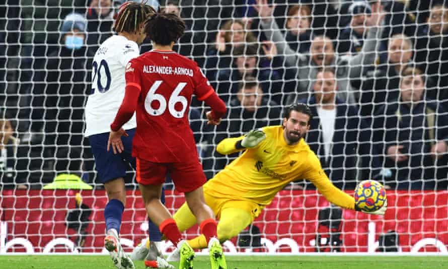 Dele Alli sees his shot saved by Alisson Becker.