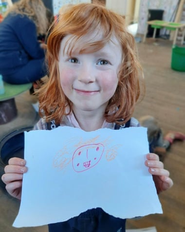Astrid Cooper, five, with her self-portrait
