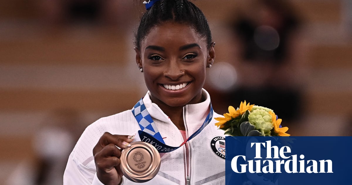 ‘I did it for me’: Simone Biles returns to Olympics to win bronze on beam