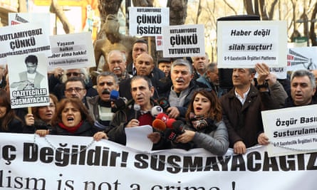 Turkish journalists hold a banner reading ‘Journalism is not a crime’ during a demonstration in support of Dündar and Gul in January in Ankara.