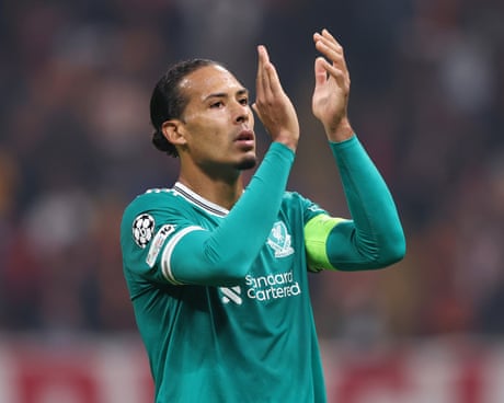 Virgil van Dijk applauds the travelling fans