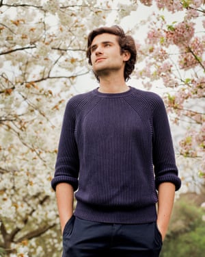 Alexander Hoyle by a tree in blossom