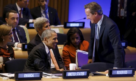 Barack Obama and David Cameron share a joke at the peacekeeper summit at the United Nations general assembly in New York.