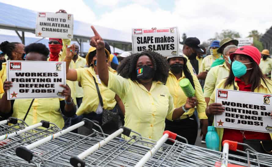 Workers strike outside a Makro store in Johannesburg.