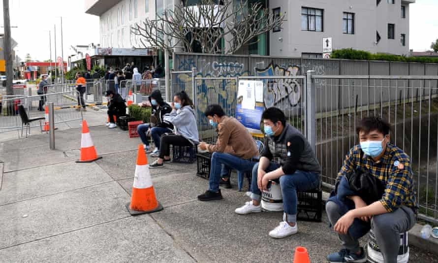 People line up at a pop-up Covid vaccination clinic at the Lebanese Muslim Association in Lakemba.