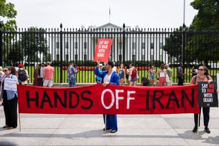 demonstrators stand outside the white house