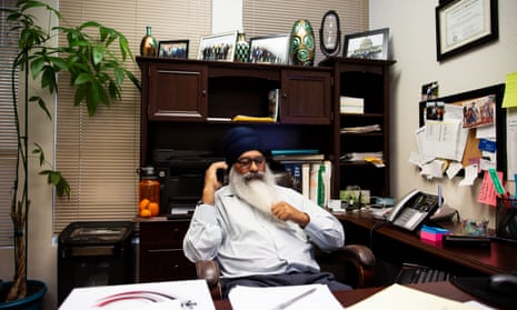 Surjit Malhi, who was the victim of a hate crime, in his office in Turlock, California.