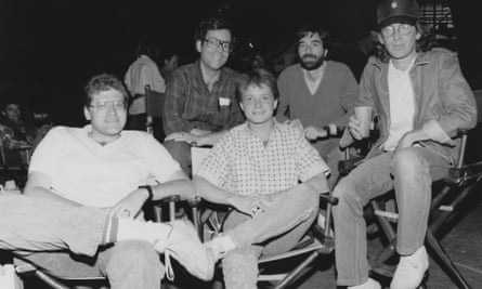 Robert Zemeckis, Bob Gale, Michael J Fox, Neil Canton, and Steven Spielberg on the set of Back to the Future.