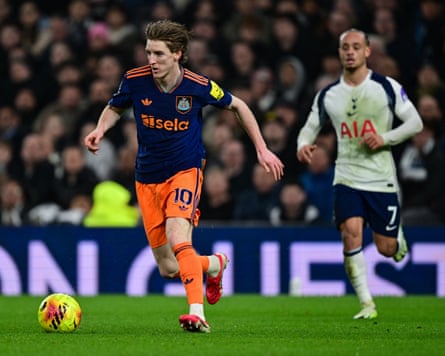 Anthony Gordon on the ball ahead of Xavi Simons during Newcastle’s win at Tottenham