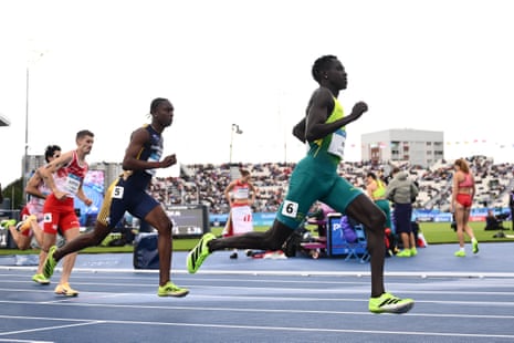 Peter Bol of Australia (right).