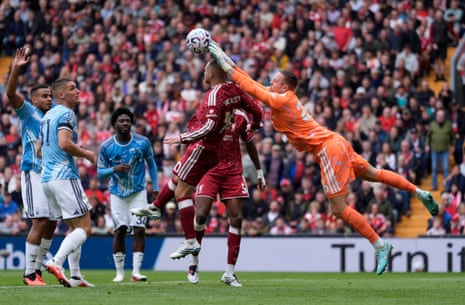 Nottingham Forest goalkeeper Matz Sels saves to stop Liverpool's Alexis Mac Allister.