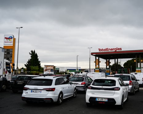 Motorists are in line to fill up their cars at a Total Energies petrol station in Beziers, southern France.
