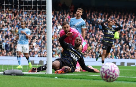 Everton’s Beto looks on with Manchester City’s Gianluigi Donnarumma after a missed chance