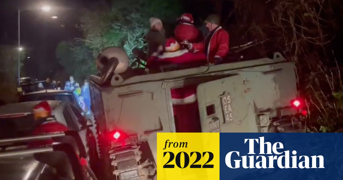 Pub-crawling Santas get armoured vehicle stuck in Cornish hedge
