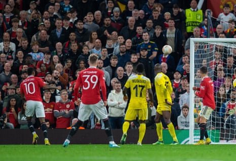 Manchester United’s Marcus Rashford scores their second goal.