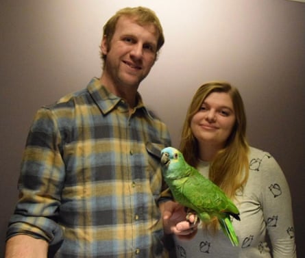 Family portrait, with the parrot on his hand