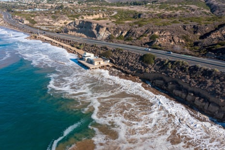 waves crash along a shore