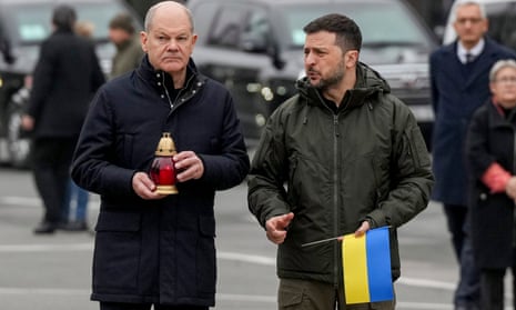 Volodymyr Zelenskyy and Olaf Scholz attend a ceremony of honouring fallen soldiers near the People’s memorial of national memory in Kyiv.
