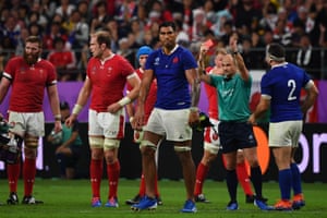 France’s lock Sebastien Vahaamahina receives a red card.