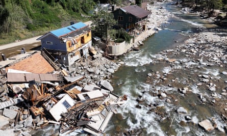 An aerial view of destroyed and damaged buildings in the aftermath of Hurricane Helene flooding on October 8, 2024 in Bat Cave, North Carolina.