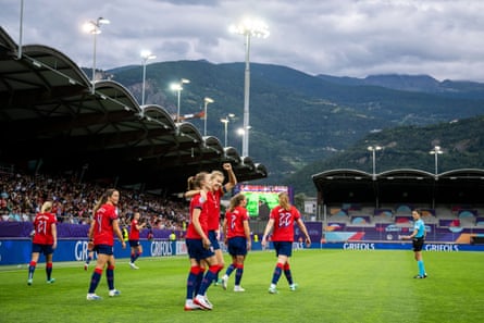 Caroline Graham Hansen (middle) celebrates pinch skipper Ada Hegerberg aft scoring against Finland.