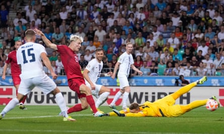 Dane Rasmus Højlund scores against Slovenia in June
